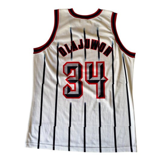 Hakeem Olajuwon #34 – Houston Rockets (Édition Champion, Blanc Pinstripes)